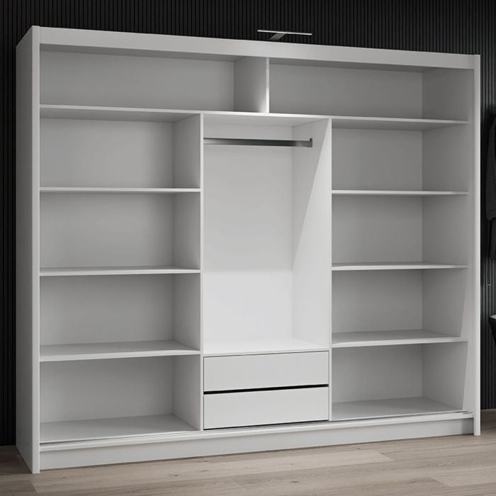 White 3-door sliding wardrobe interior with shelves and two drawers