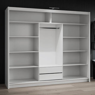 Open wardrobe interior with shelves, hanging rail, and two drawers