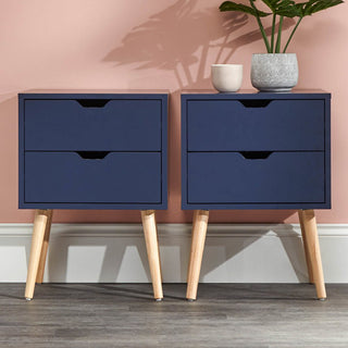 Pair of Nightshadow Blue wooden bedside cabinets, each with two drawers and angled legs.