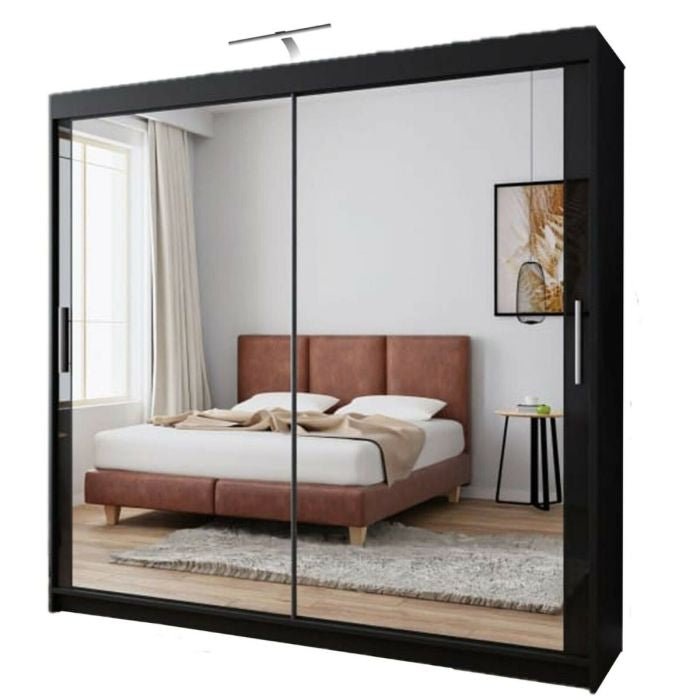 Black 2-door mirrored sliding wardrobe with full-length mirror reflecting brown bed and white bedding