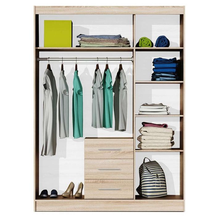 Wardrobe interior with hanging clothes, folded items on shelves, and three drawers visible.
