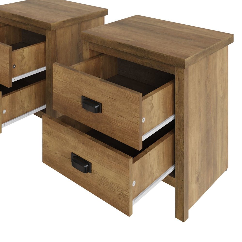Pair of BALCOMBE Knotty Oak wooden bedside cabinets with two drawers each, showing partially open drawers.