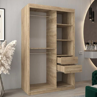 The CHOICEWARDROBE Beloit Mirrored Wardrobe with 2 sliding doors and Sonoma Oak mirrored fronts stands in a modern room with striped walls, a round mirror, and decorative plants.
