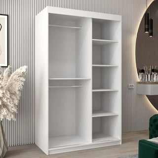 The CHOICEWARDROBE Beloit Sliding Door Wardrobe features a sleek white finish, mirrored sliding doors, and ample storage—ideal for stylish UK bedrooms with modern decor.
