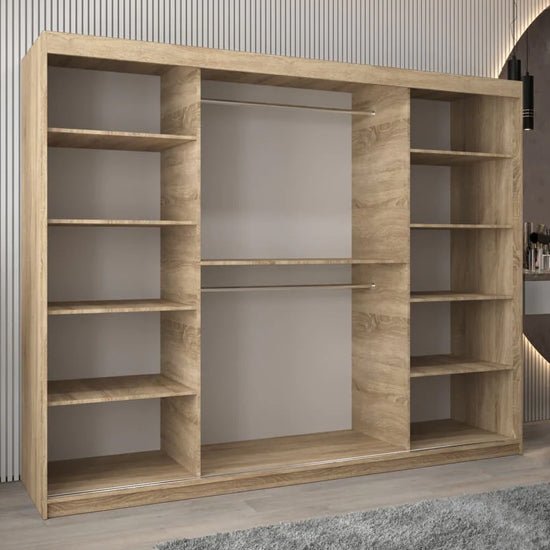 Beloit 3-door sliding wardrobe in Sonoma Oak effect with mirrored fronts, showing open shelving and hanging space.