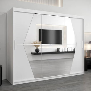 The Beloit Mirrored Wardrobe 3 Sliding Doors 250cm in White adds modern style to a minimalist room with grey flooring, wall-mounted TV, decorative shelf, and lamp. Perfect as sleek, functional bedroom furniture.