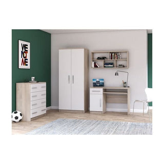 A modern bedroom with green and white walls, a CHOICE Orlan 4 Drawer Chest – Sonoma Oak & White, a white wardrobe, desk with shelves, books, lamp, framed VENOM print, and soccer ball on a light wood floor with gray rug.
