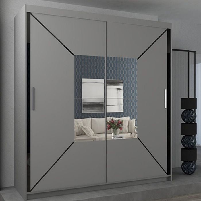 The CHOICEWARDROBE Bartholomew Sliding Door Wardrobe in matt grey with a geometric diagonal panel design features mirrored doors, reflecting modern décor while providing ample storage and stylish elegance to any living space.