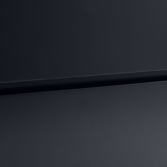 A close-up of the CHOICEWARDROBE Abrina 80cm Anthracite 2 Door Wardrobe with Drawers shows its smooth, matte dark grey surface and a sleek horizontal groove for a clean, modern Scandinavian look.