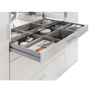 A gray organizer drawer slides out from the CHOICEWARDROBE Acorn 3 Door Mirrored Wardrobe (135cm White Finish), revealing compartments for watches, jewelry, and accessories. A mirror is attached above the drawer within the cabinet.