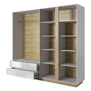 The CHOICEWARDROBE Alaro High Gloss White Mirrored Wardrobe is a modern 4-door unit with gold trim, wooden interior, two left-side open drawers, a hanging rod above, and right-side storage shelves for optimal organization.