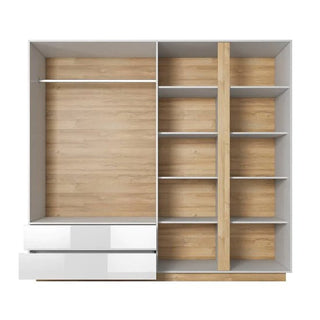 The CHOICEWARDROBE Alaro is a modern luxury 4 door wardrobe in high gloss white with mirrored doors, gold trim, interior shelving, hanging rod, and drawers for stylish and practical storage.