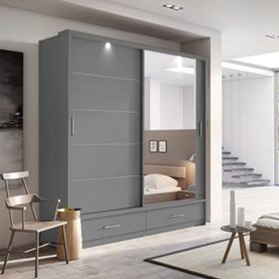 Grey sliding wardrobe with mirrored door and LED lighting. CHOICEWARDROBE Aliso.