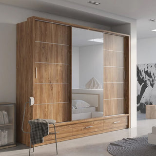 ChoiceWardrobe Allen 250cm oak sliding wardrobe with mirrored centre door and lower drawers, styled in a modern bedroom.