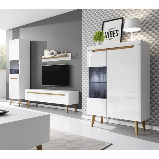 Modern living room with white high-gloss TV unit and tall cabinet with oak legs.