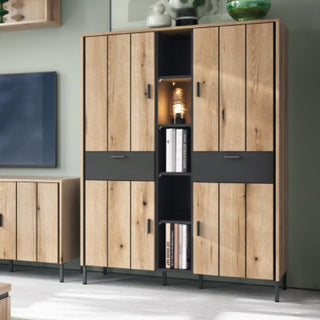 The CHOICEWARDROBE Arthur 119cm 4 Door 2 Drawer Wooden Wardrobe in Grey Oak is a modern storage cabinet featuring shelves, drawers, and open display—ideal for bedroom organization or showcasing books and decor.