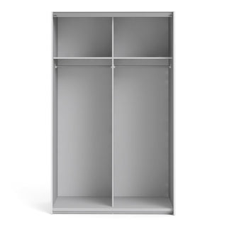 Spacious empty interior of ChoiceWardrobe 2 Door White Sliding Wardrobe with matte finish and shelf compartments.
