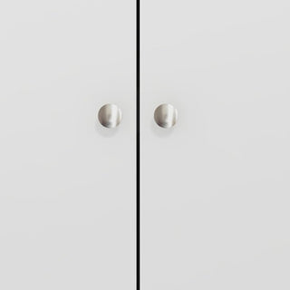 A close-up of two silver round handles on the CHOICEWARDROBE Asmara 2 Door Wardrobe, featuring a white gloss finish and mirrored decorative panel, separated by a slim vertical gap.