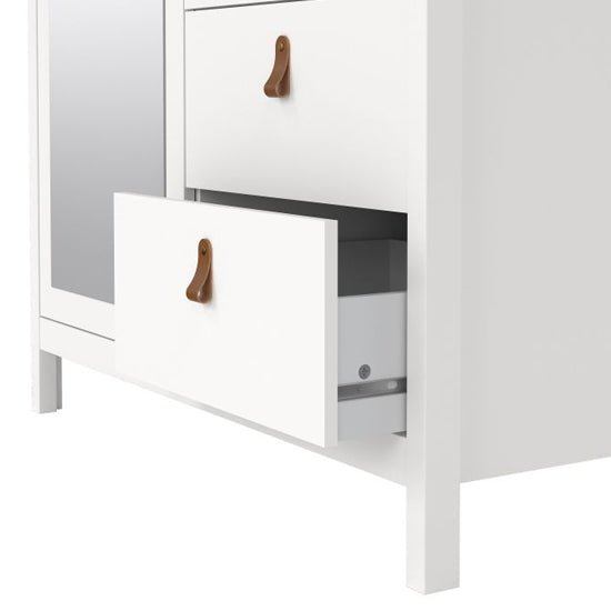 White wooden wardrobe with two storage drawers featuring brown leather-look handles.