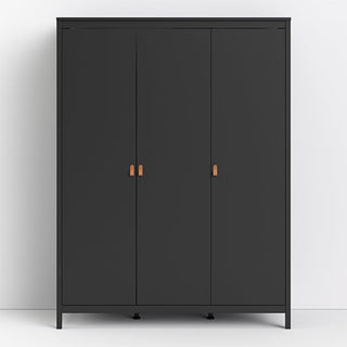 The CHOICEWARDROBE Barcila 3-door wooden wardrobe, 150cm wide with a modern matt black finish and tan leather handles, stands against a white wall on a light floor, showcasing its minimalistic and contemporary shelved storage design.