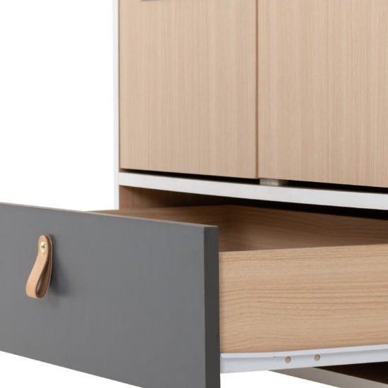 Open grey wardrobe drawer with leather handle and visible wood-effect interior. CHOICEWARDROBE Batam Oak Effect & Grey.