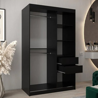 The CHOICEWARDROBE Beloit 2 Door Sliding Mirrored Wardrobe in matte black with a geometric mirror, hanging rail, and shelves adds stylish storage to any modern bedroom with its sleek design—ideal for rooms with striped walls and chic décor.