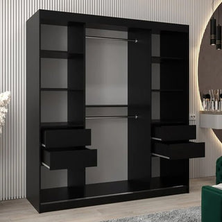 Angled view of ChoiceWardrobe Beloit black sliding wardrobe with mirror doors – sleek modern design creating depth and reflection in the bedroom.
