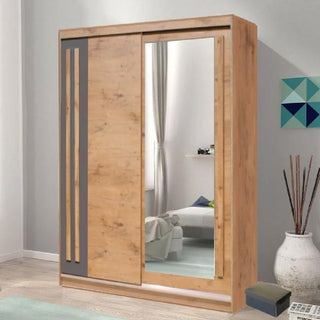 The CHOICEWARDROBE Brentwood 175cm Sliding Wardrobe in Lancelot Oak, featuring two doors—one with a mirror—adds modern storage and style to a light, minimally decorated bedroom.