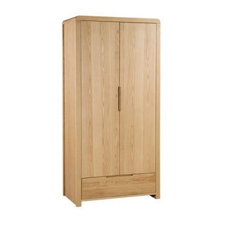 The CHOICEWARDROBE Camber Wooden Wardrobe features a solid white oak build, two doors, a bottom drawer for storage, and a natural waxed oak finish with visible wood grain—perfect for stylish, modern bedroom organization.