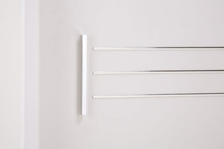 A close-up of the CHOICEWARDROBE Capri White Sliding 2 Door Wardrobe shows a matt white door with a vertical silver handle on the left and three parallel horizontal silver lines on the right.