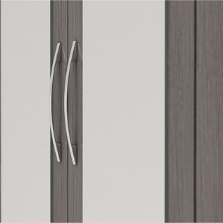 Close-up of the CHOICEWARDROBE Cerritos 116cm 1 Door Metal Locker Wardrobe in an industrial orange finish with vent detailing and storage shelves, highlighting its modern vertical door and sleek metallic handle.