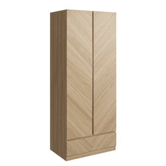 Light wood 2-door wardrobe with chevron pattern and 1 bottom drawer in Euro Oak finish.