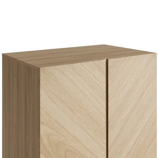 A close-up of the CHOICEWARDROBE Cianna Euro Oak 2 Door Wardrobe with Drawer shows its modern chevron pattern, light euro oak finish, and visible wood grain on the top section.