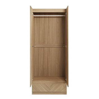 The CHOICEWARDROBE Cianna Euro Oak 2 Door Wardrobe with Drawer features a light, natural finish, open doors revealing an empty interior with a top hanging rod and chevron pattern, plus a closed bottom drawer.