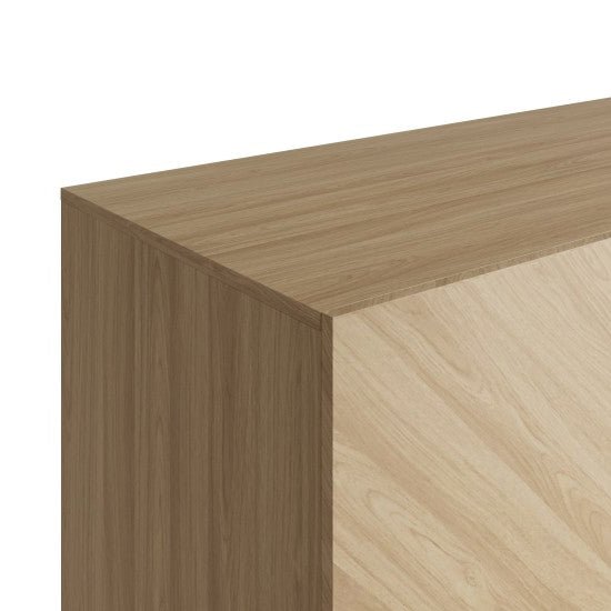 A close-up of the top and sides of the CHOICEWARDROBE Cianna 3 Door Wardrobe in Royal Walnut finish, showcasing its smooth surface and chevron wood grain pattern.