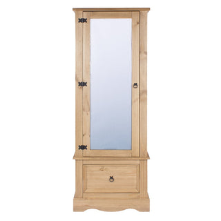 The CHOICEWARDROBE Consett 1 Door Mirrored Wardrobe features natural waxed pine, a mirrored door, black metal hinges, a ring handle, and a bottom drawer for extra storage. Its rustic solid wood design adds charm to any bedroom.