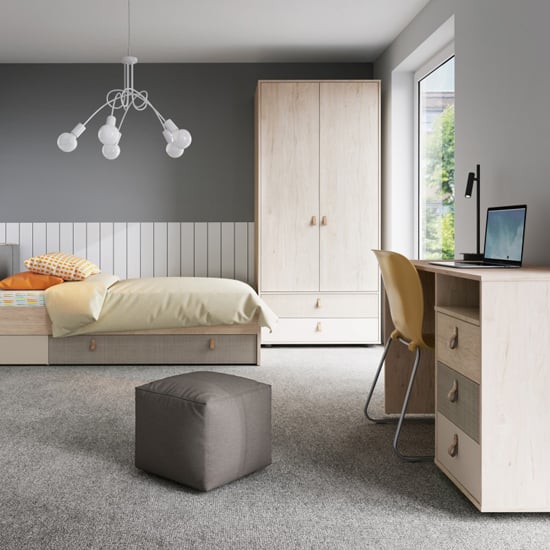 Danville 2-door hinged wardrobe in light walnut with textured panels, shown in a modern bedroom setting.