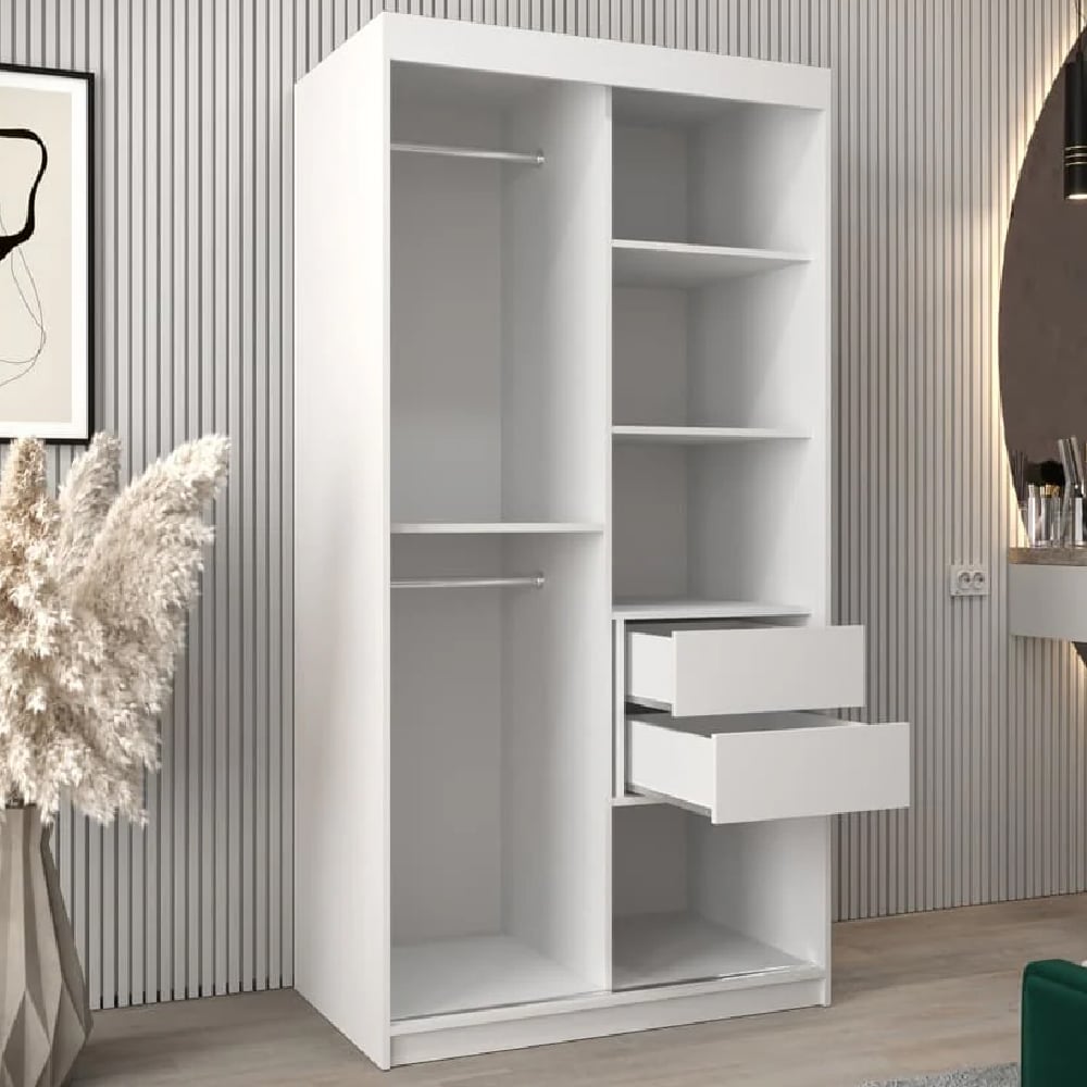 White CHOICEWARDROBE Danville wardrobe with sliding doors, showing open interior with shelves and drawers.