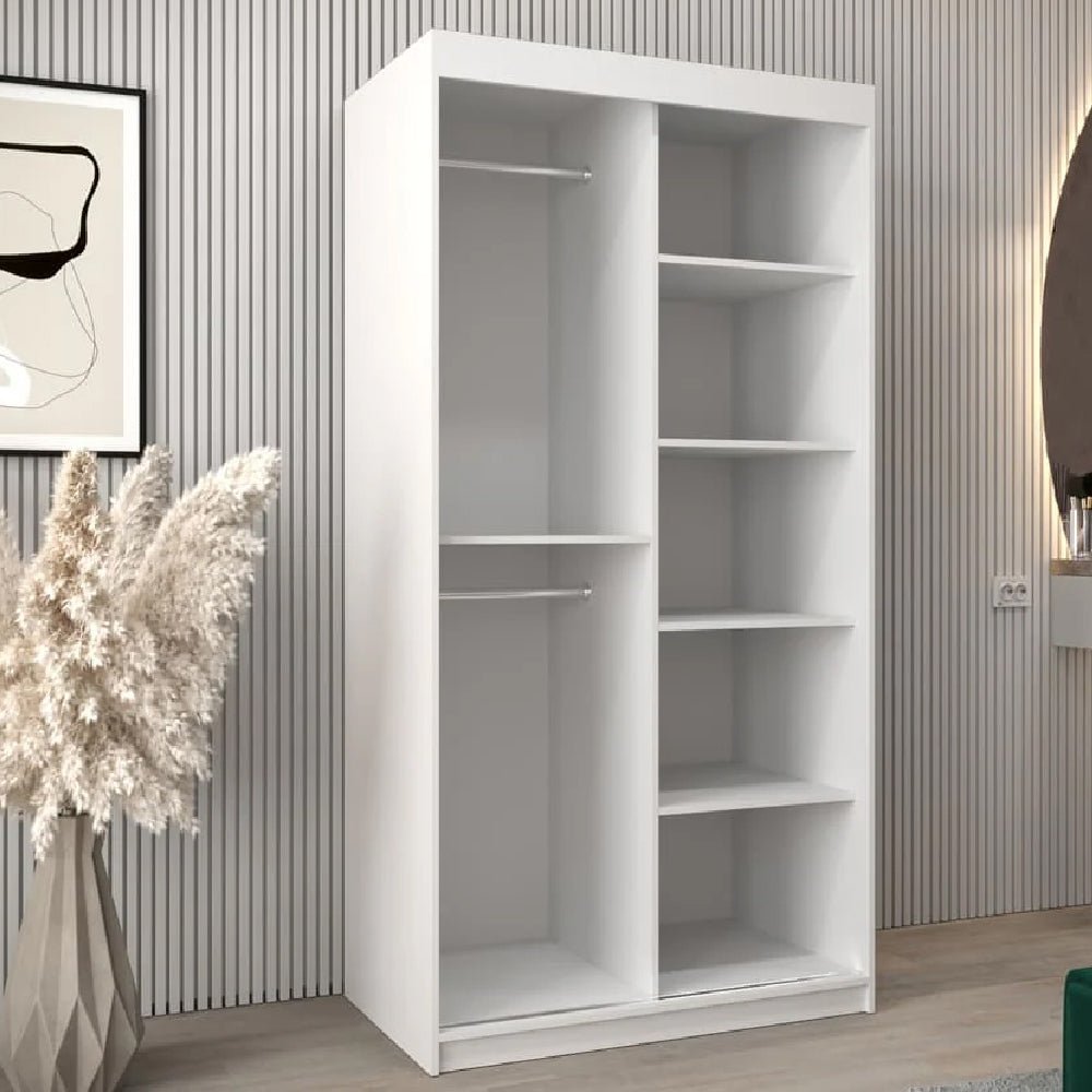 White compact wardrobe with mirrored sliding doors, showing hanging space and shelves inside.