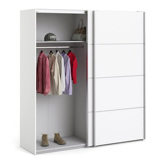 The CHOICEWARDROBE Dcap Wooden Sliding Door Wardrobe in white features two panelled doors, a double hanging rail with five shirts, boots on the bottom shelf, and a baseball cap plus handbag on the top shelves; width: 180cm.