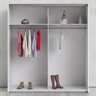 The CHOICEWARDROBE Dcap Wooden Sliding Door Wardrobe in white (180cm) features double hanging rails with three shirts, a sweater, and a red jacket on the left, three pairs of shoes below, along with two handbags, a green cap, and hangers on the right.