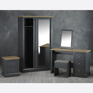 A bedroom set in charcoal grey with wood accents, featuring the CHOICEWARDROBE Devan 2 Door Sliding Wardrobe (charcoal grey, oak top, full-length mirror), a 3-drawer nightstand, a dressing table with stool, and a framed mirror.