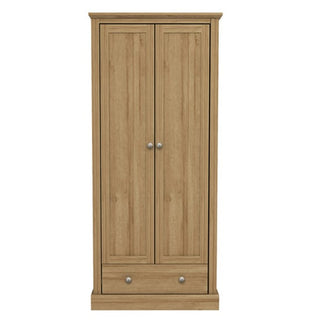 The CHOICEWARDROBE Devan 2 Door Wardrobe is a compact 80cm wide oak finish unit with two vertical hinged doors featuring round metal handles and a matching-handled bottom drawer, all in a light, natural look.