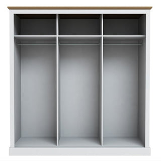 Interior view of ChoiceWardrobe Devan 3 Door Wardrobe showing double hanging rails and spacious upper shelves
