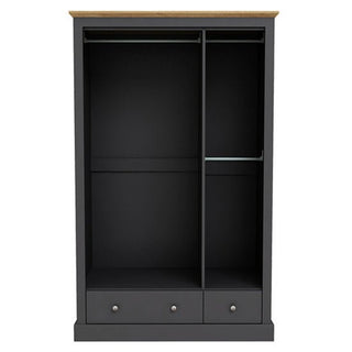 The CHOICEWARDROBE Devan 3 Door Wardrobe (113cm wide) in charcoal grey with an oak top offers spacious hinged bedroom storage, two hanging sections, and two drawers—perfect for organizing clothes in style.