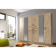 Contemporary 6 door oak mirrored wardrobe with sleek handles and central drawers, designed for grand modern bedrooms across the UK.
