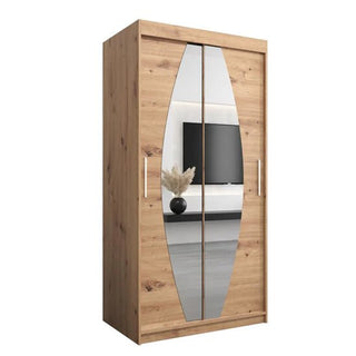 The CHOICEWARDROBE Eden 100cm Oak Mirrored Wardrobe features a contemporary 2-door design with unique curved mirror panels and organised storage, blending elegant style with practical functionality for modern interiors.