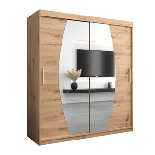 The CHOICEWARDROBE Eden 180cm Oak Mirrored Sliding Door Wardrobe features a contemporary curved mirror design, hanging rail, and storage shelves, reflecting a modern living room with a wall-mounted TV and decorative shelf.