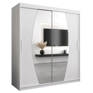 The CHOICEWARDROBE Eden 2 Door Mirrored Sliding Wardrobe (180cm, white finish) with elegant curved mirrors reflects a modern bedroom featuring a wall-mounted TV, floating shelf, and a vase of dried pampas grass.