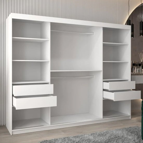 White 3-door sliding wardrobe with open shelves and pull-out drawers visible